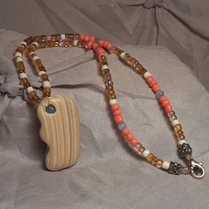 Artisan natural shell and glass bead necklace